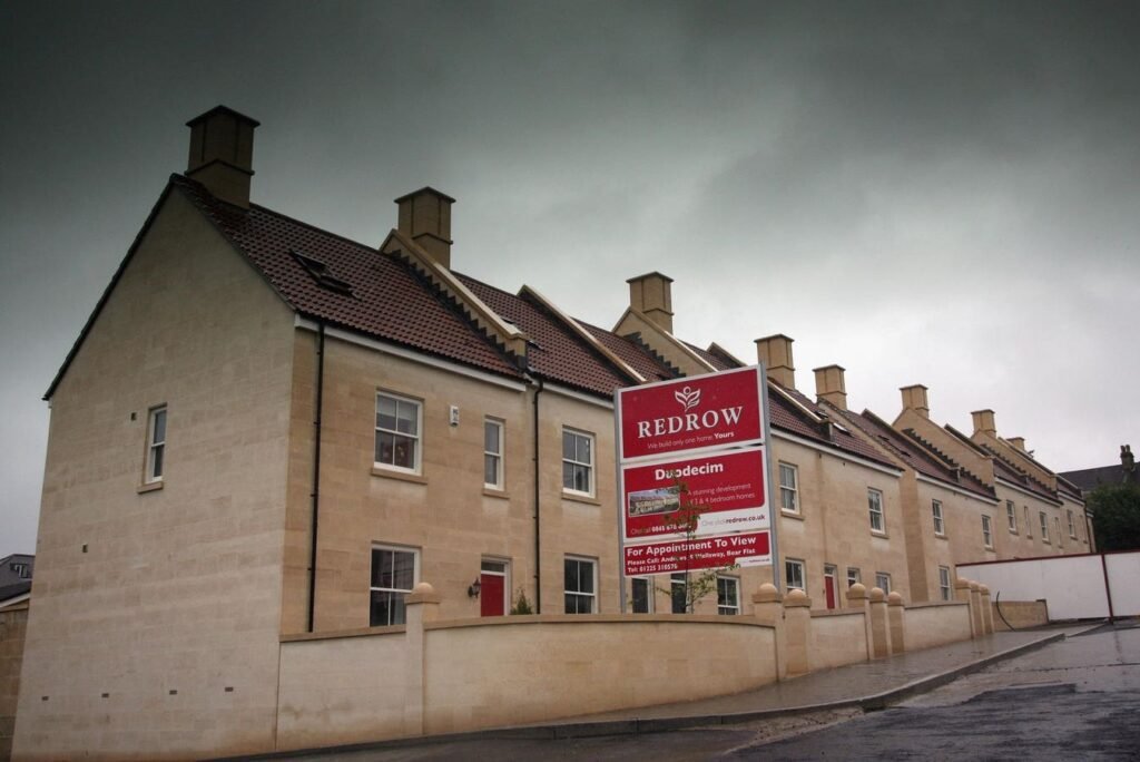 Redrow shares fall 6% as they cut full-year profit forecasts